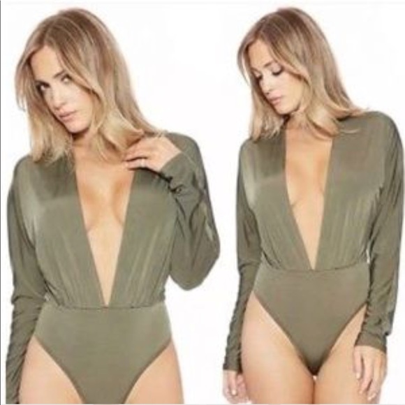 naked wardrobe Other - Black body suit.  Size s.